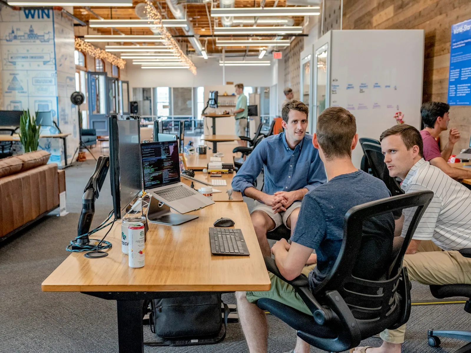 An in-house team collaborating in a bright office